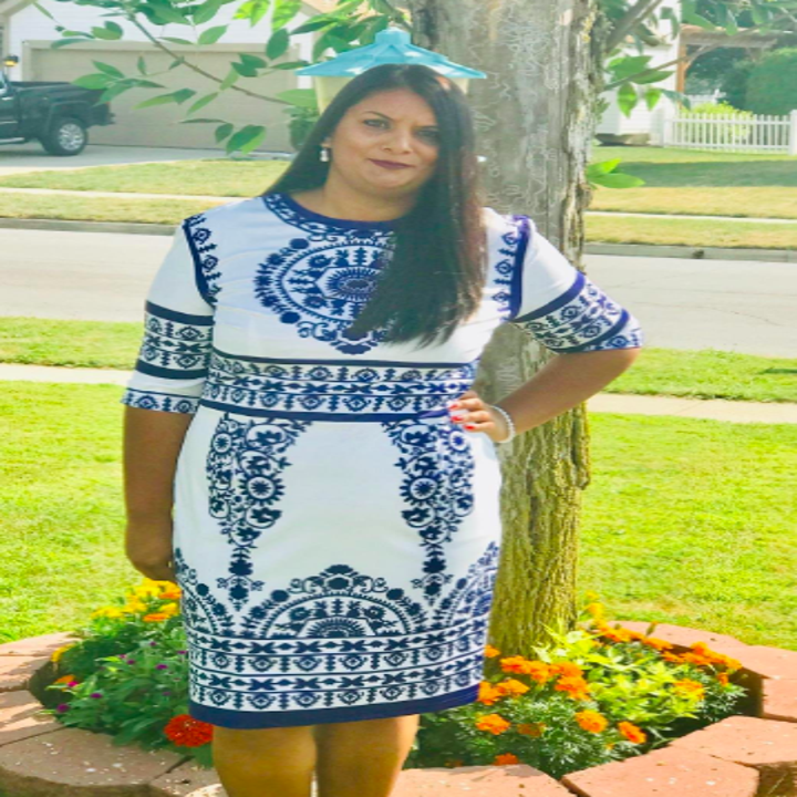 A reviewer wearing the three-quarter-sleeve version