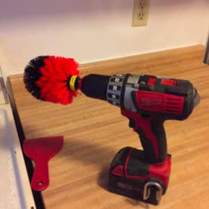 the brush attachment on a drill