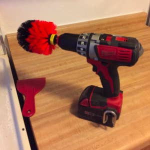 the brush attachment on a drill