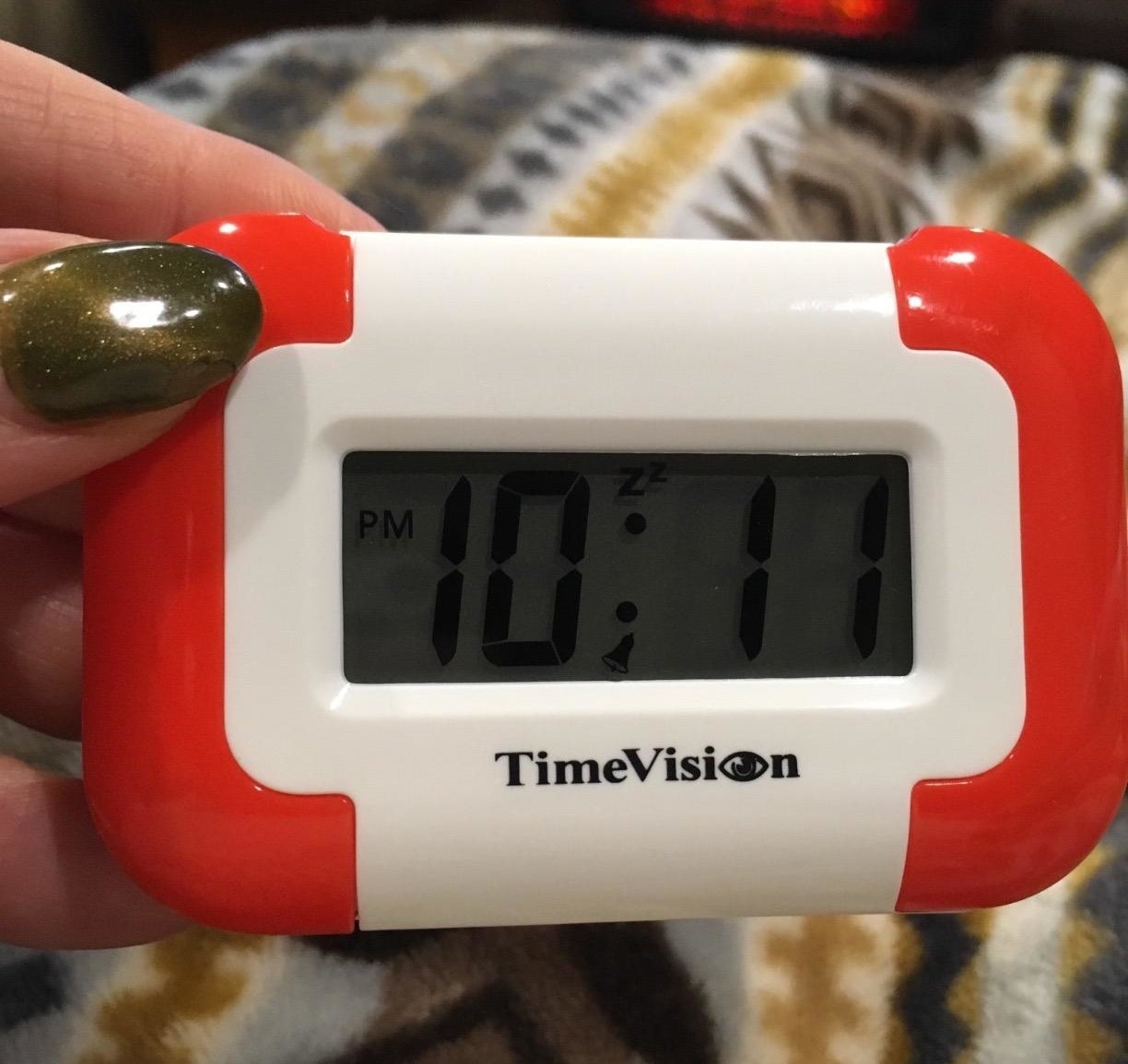 Promising review: "I started exercising in the early a.m. and was stressed that I would wake up my husband and toddler. I was looking into the Fitbit bracelet because it has a vibrating alarm clock but 1) I do not want to wear one every day and 2) I don't want to spend $$$. I found this, and I LOVE it. It really wakes me up, but not the rest of my family. I can't imagine anyone sleeping through it who has it under their pillow. I very much prefer waking up to my ShakeAwake than an obnoxious sound alarm from across the room." —minkalueGet it from Amazon for $17.99.