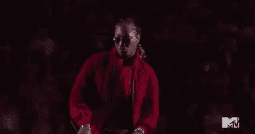 A gif of Future the rapper dancing on stage