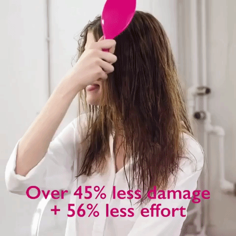 A gif of a model brushing through damp hair, with text 