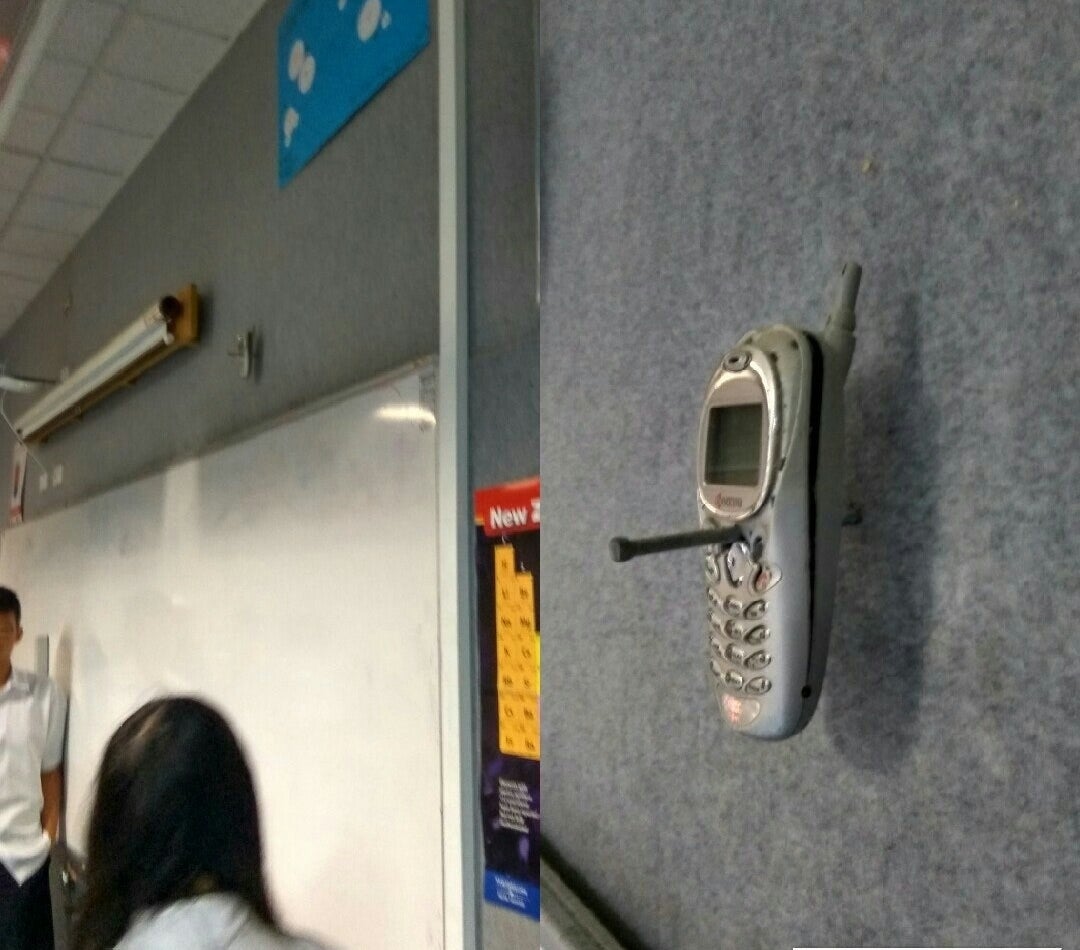 Прибитый телефон к стене