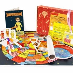 A board game, a map, a book, and other featured items inside the crate