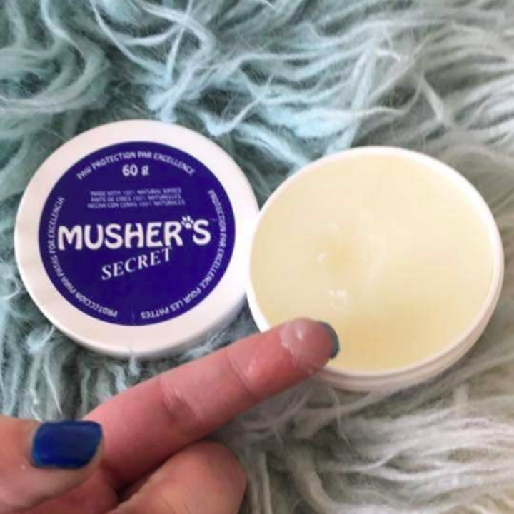 a hand with the waxy musher's product on their finger 