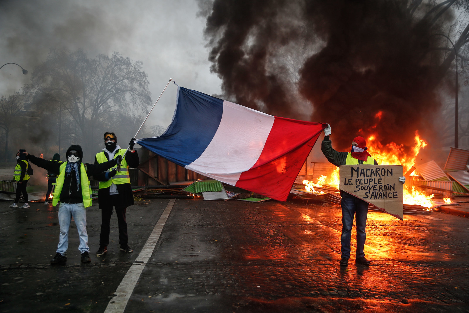 Rioters Protesting The Price Of Fuel Surrounded The Arc De Triomphe In ...