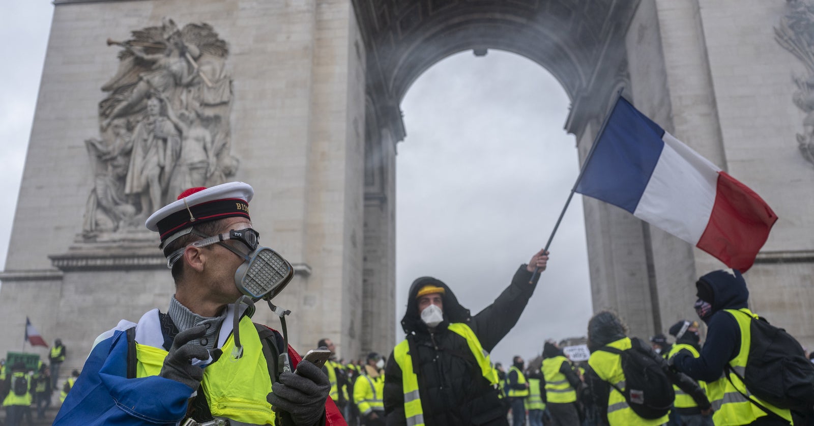 Rioters Protesting The Price Of Fuel Surrounded The Arc De