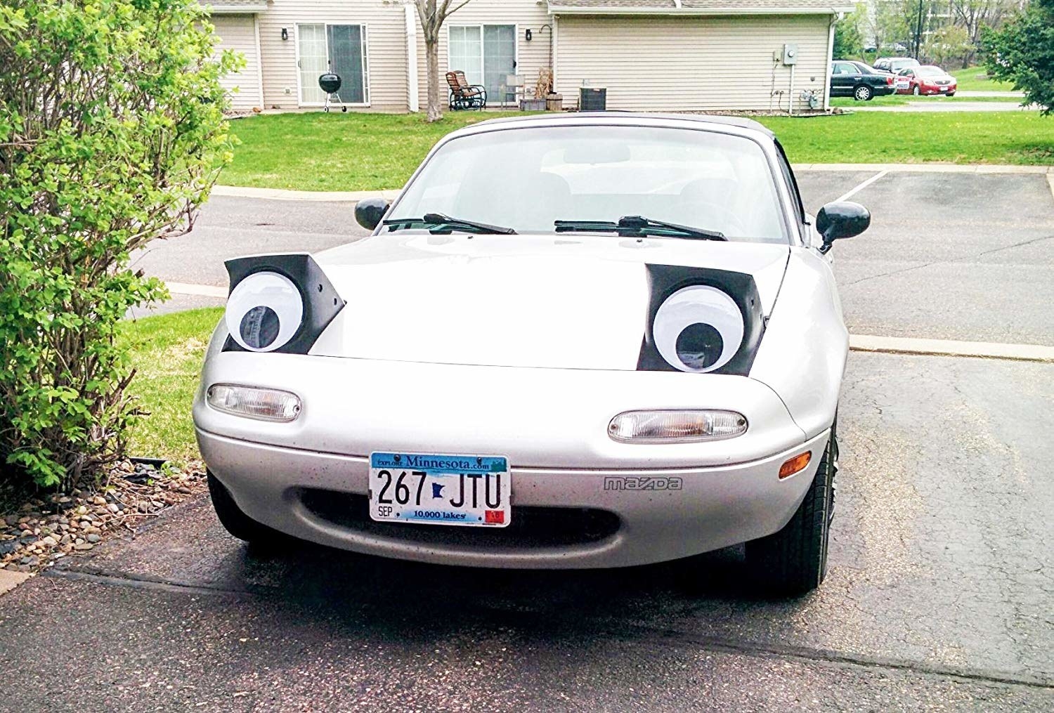 car with googly eyes on it 
