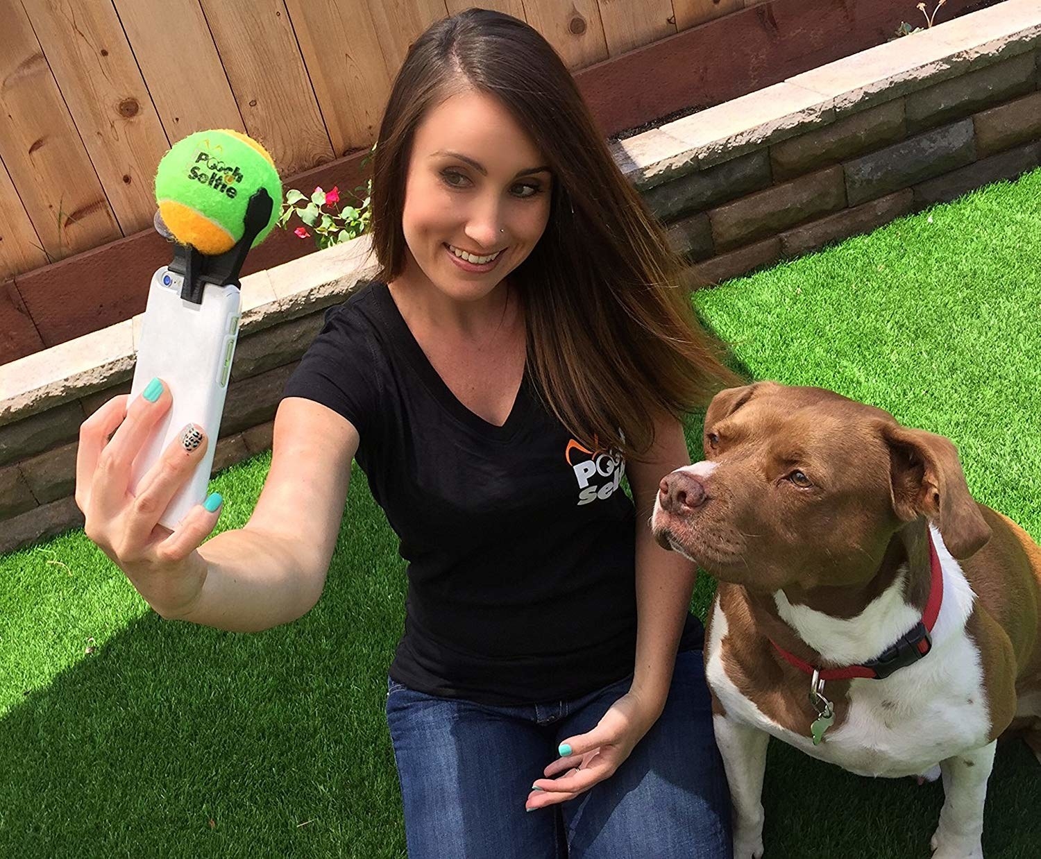 model taking a selfie with a dog
