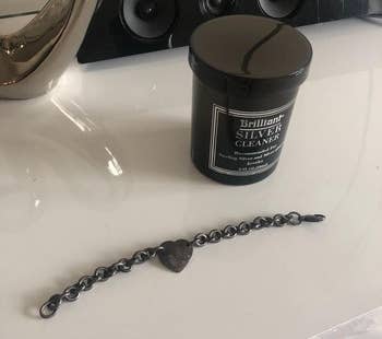 reviewer's tarnished silver bracelet before cleaning