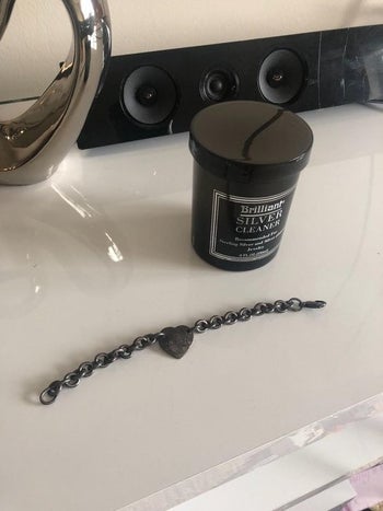 reviewer's tarnished silver bracelet before cleaning