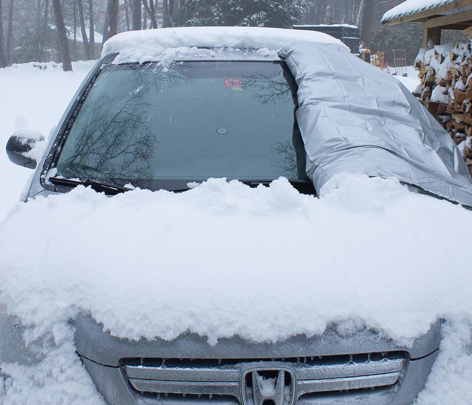 It suction cups to your windshield and secures around your wheels for a snug fit that won't let any stray flakes underneath.Get it from Amazon for $26.95 (available in two sizes, one for most cars/CRVs and one for most SUVs/RVs/trucks, and two colors).Promising review: "This is the best thing I could have ever bought! I bought one for myself, my mom and my sister. New England just got slammed with a Noreaster, and let me tell you... this thing works! Because mine didn't budge. It only took about five minutes to put on my car, and like five seconds to get it off this morning. No snow or ice anywhere on the wiper well or windshield. I highly recommend this!" —Shelley