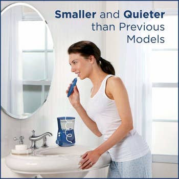 Model using the waterpik handle with text 