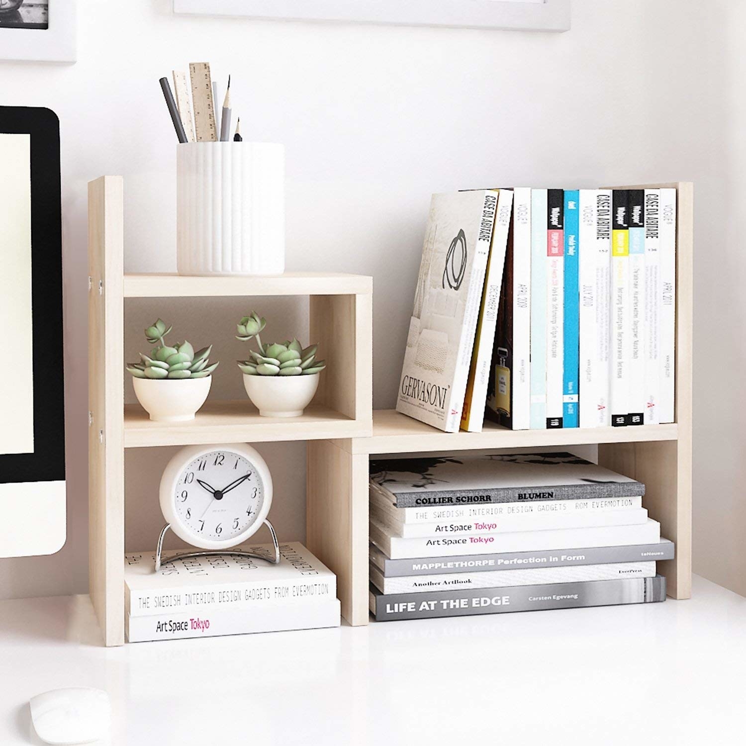 the shelves with desk items on them 