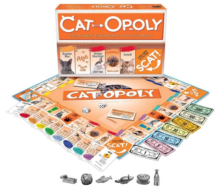 cat themed monopoly with cat locations and cat-related charms 