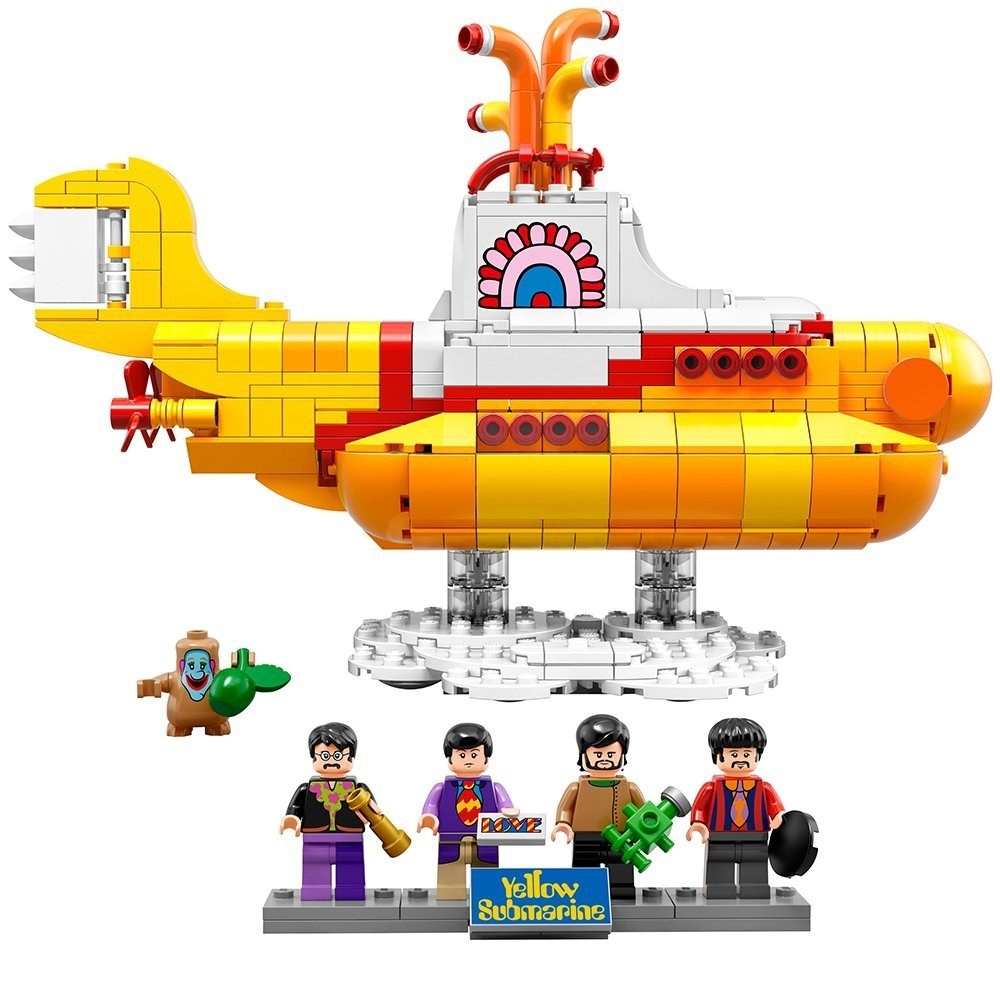 lego submarine with four beatles minifigs holding items and a small jeremy figure 