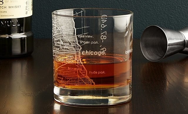 The whiskey glass with the Chicago design on it 