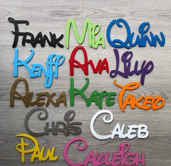 Various colored Disney font wooden name signs
