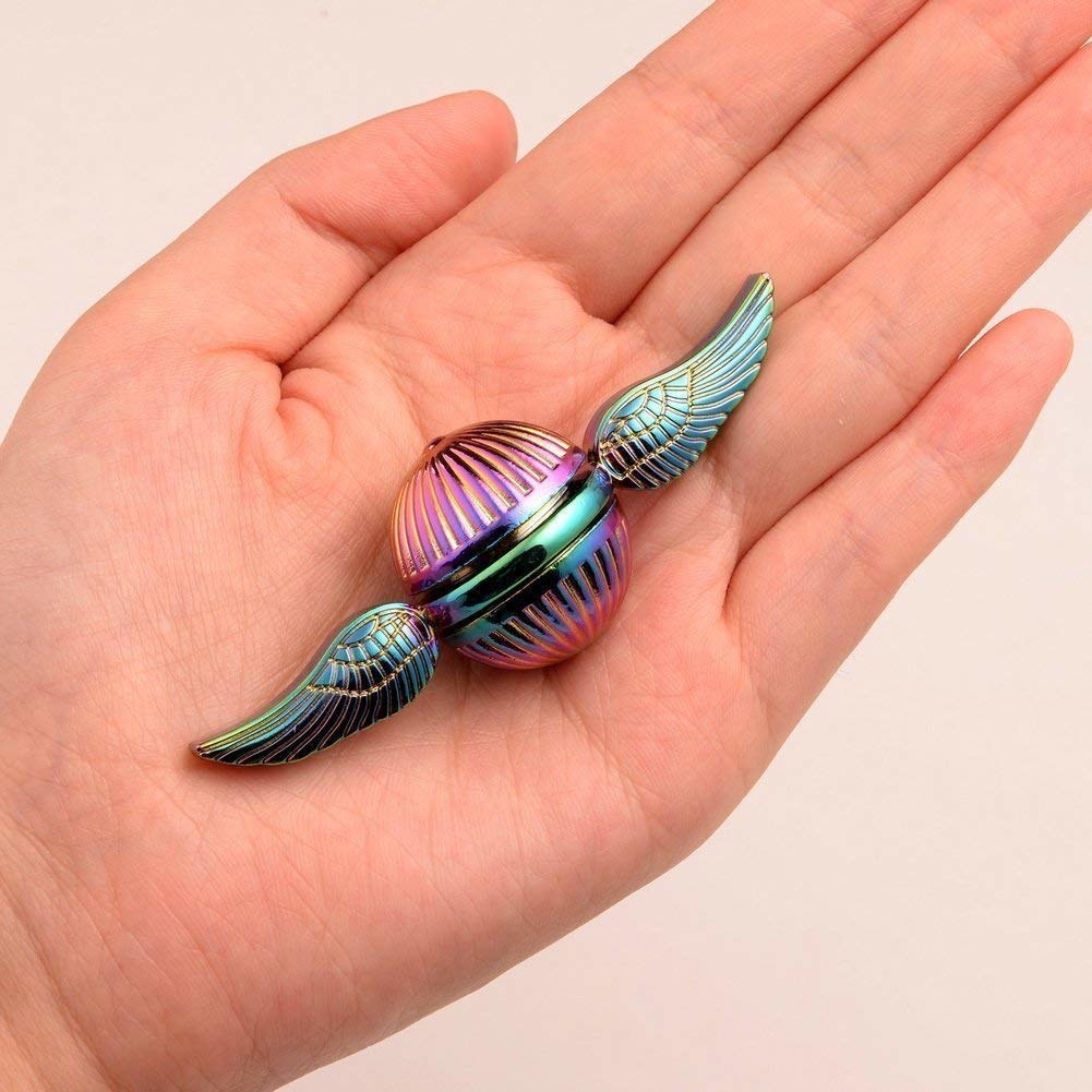 The rainbow toy that looks like a Flying Snitch with wings coming out of the sides