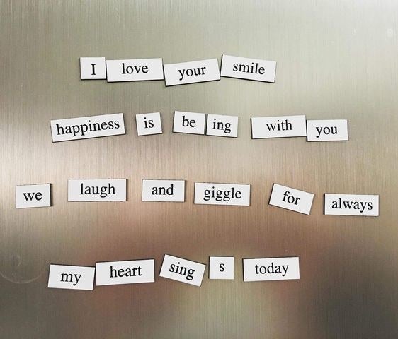 reviewer photo of reviewer having made cute messages with the magnet like "I love your smile"