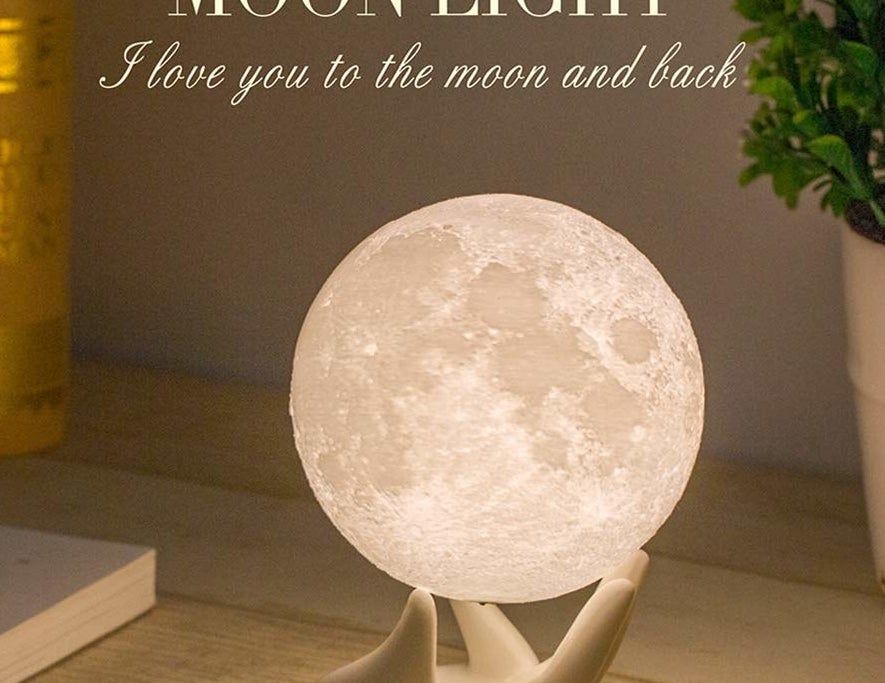 the small globe light that does look like the moon, balanced on the included stand