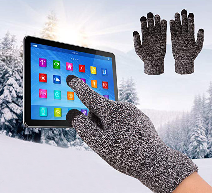hand wearing glove touching a screen