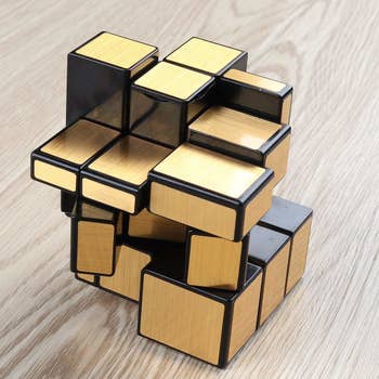The cube mixed up; because of the slightly different sizes, it looks like a jumble of different sized rectangular prisms