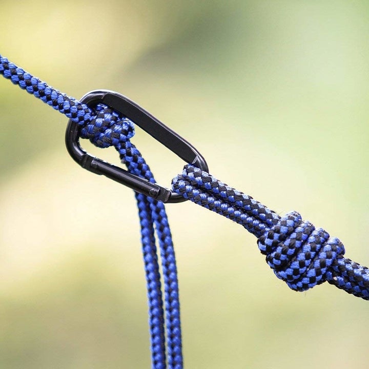 close up of the carabiner, rope