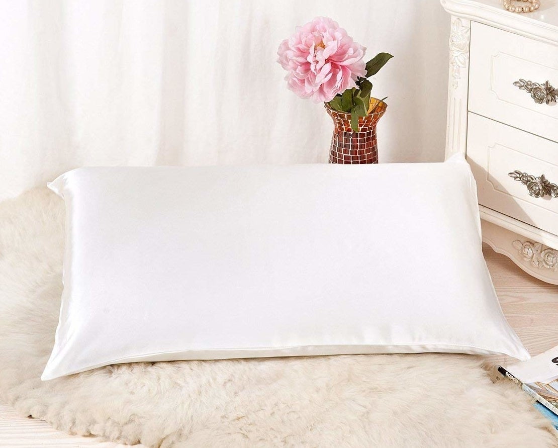 The satin pillowcase on a standard size pillow
