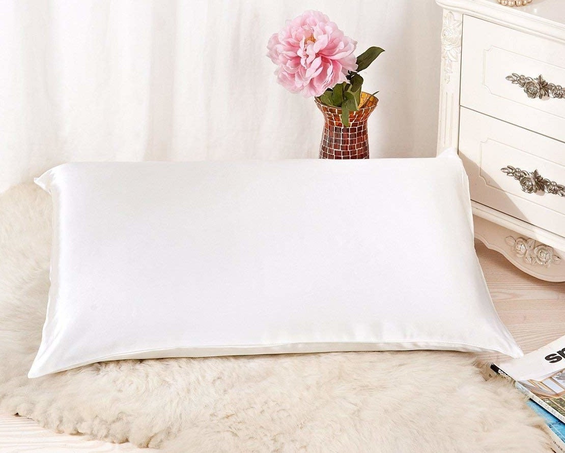 The satin pillowcase on a standard size pillow