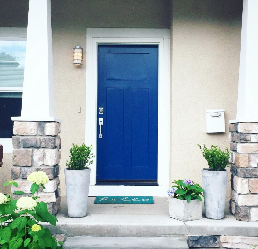 Reviewer&#x27;s front door painted in a bold blue