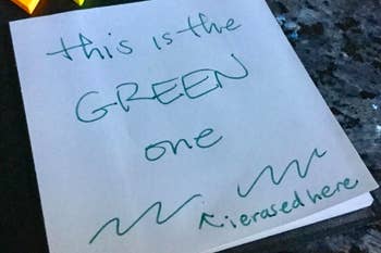 reviewer photo of their writing in green ink