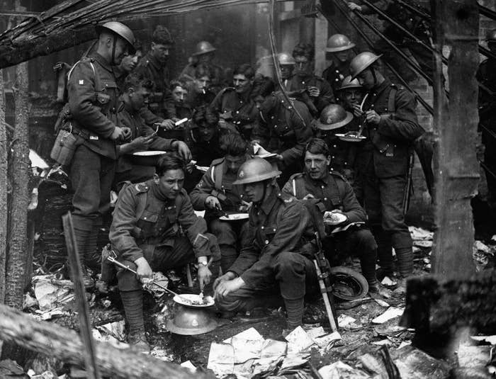 1921: Soldiers have a meal in the remains of the Custom House, Dublin (headquarters of the British Civil Service in Ireland), burned by the IRA during nationalist unrest.