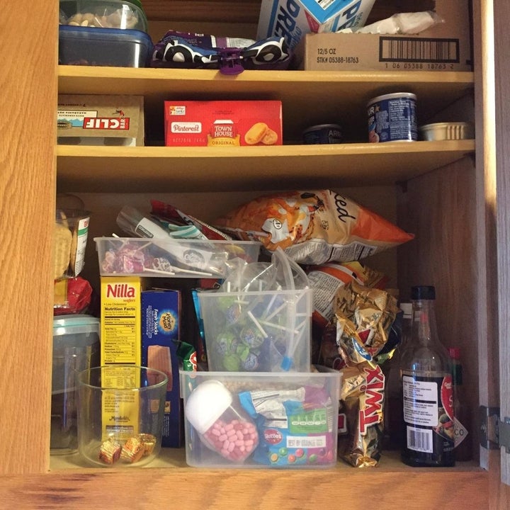reviewer image of a cluttered kitchen cabinet