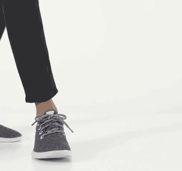 gif of model showing different angles of grey allbirds