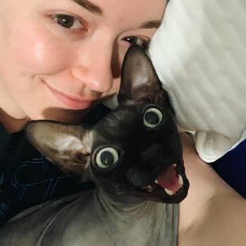 A photo of BuzzFeed writer Mallory Mower and her cat 