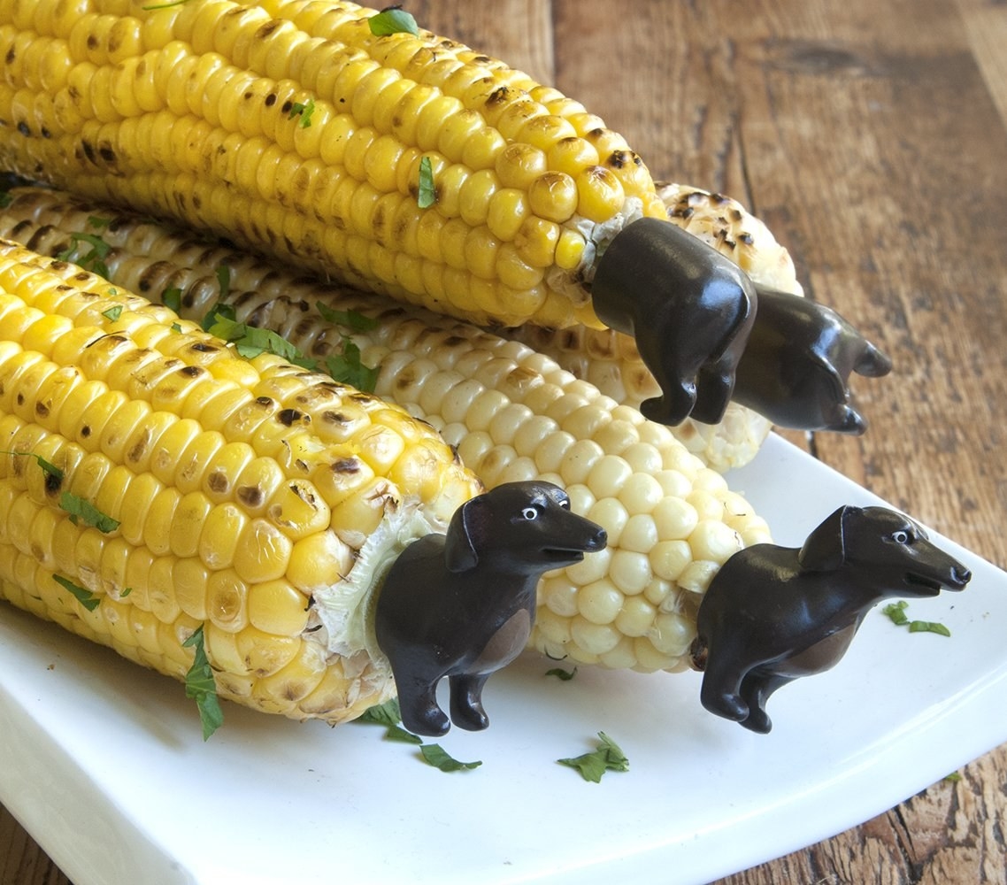 corn holders shaped like dog front and backs