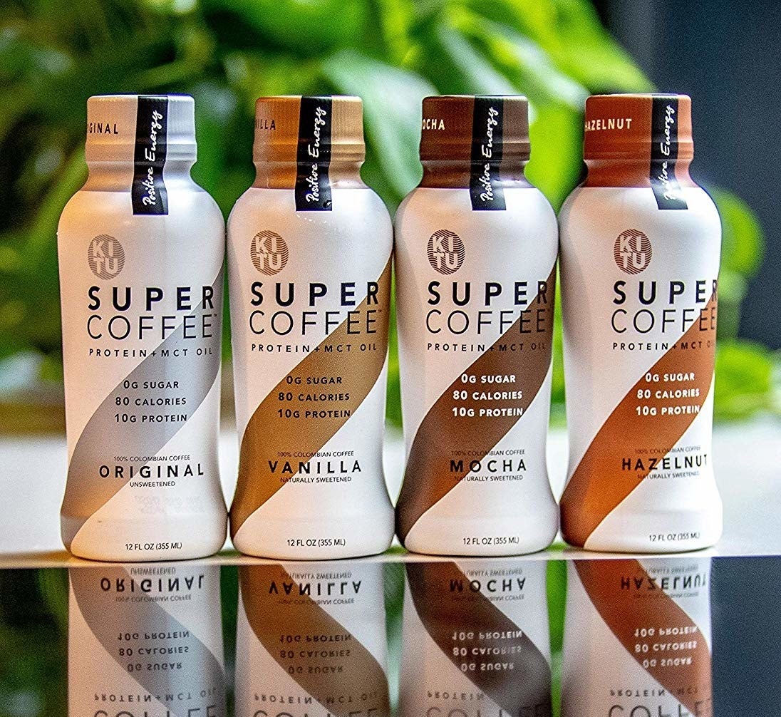 Four bottles of different flavored Kitu coffee