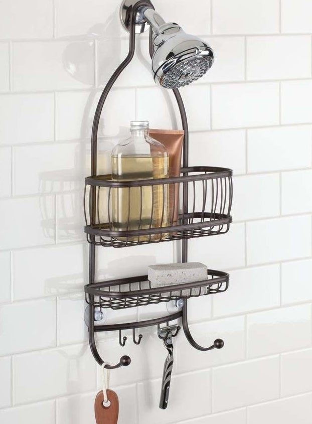 brown metallic over-shower-head rack with two racks and many hooks
