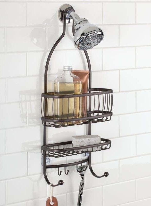 brown metallic over-shower-head rack with two racks and many hooks