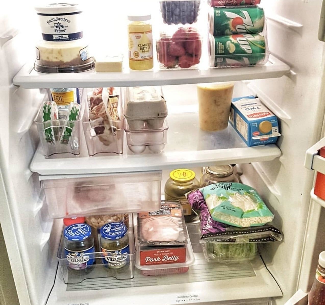 reviewer photo of a refrigerator with its contents neatly organized in clear bins