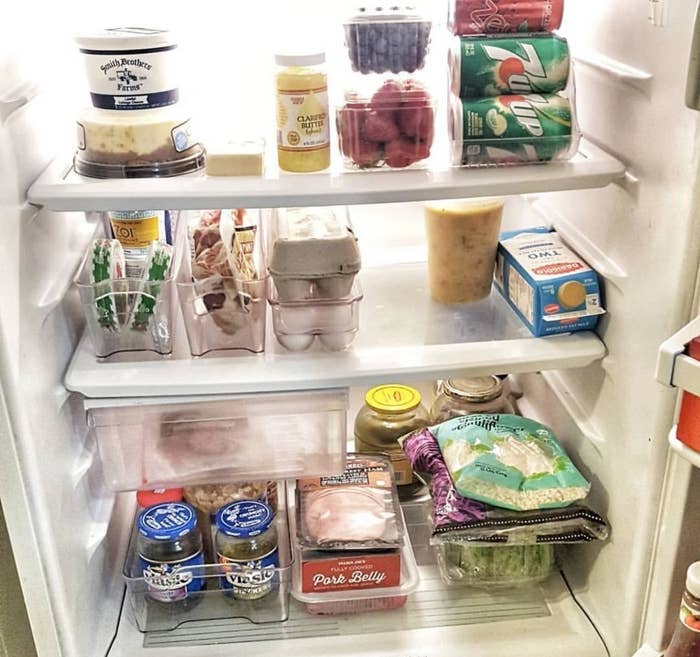 Reviewer photo showing the inside of a fridge organized using the bins