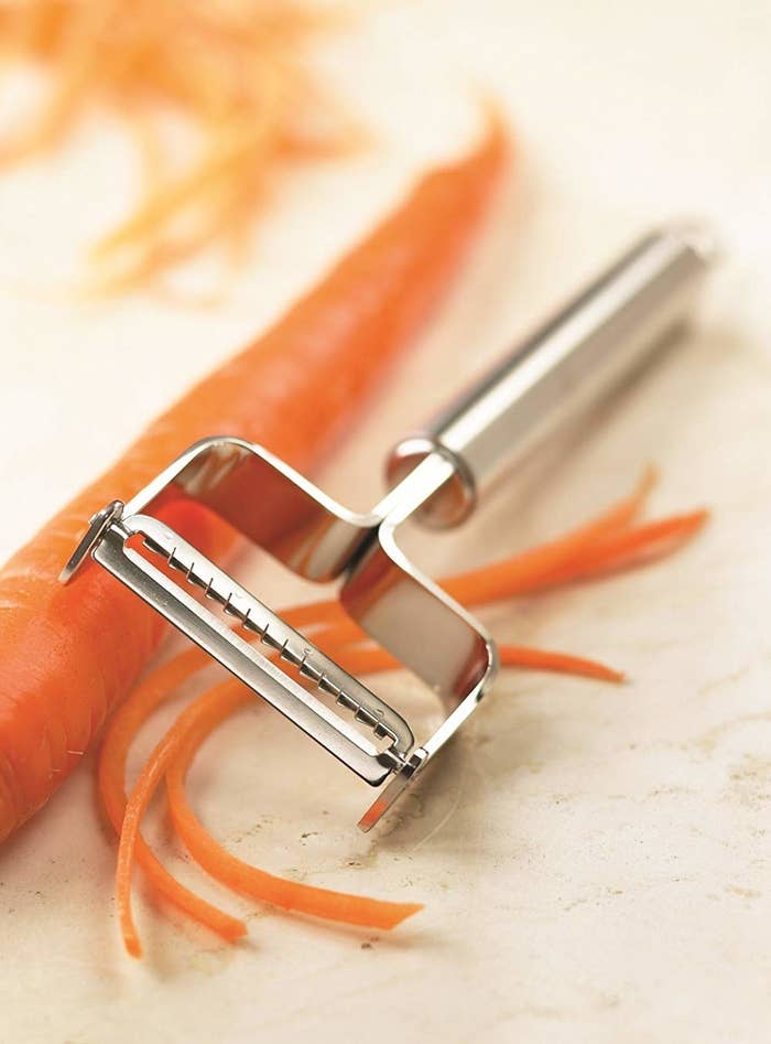 The peeler and a peeled carrot 