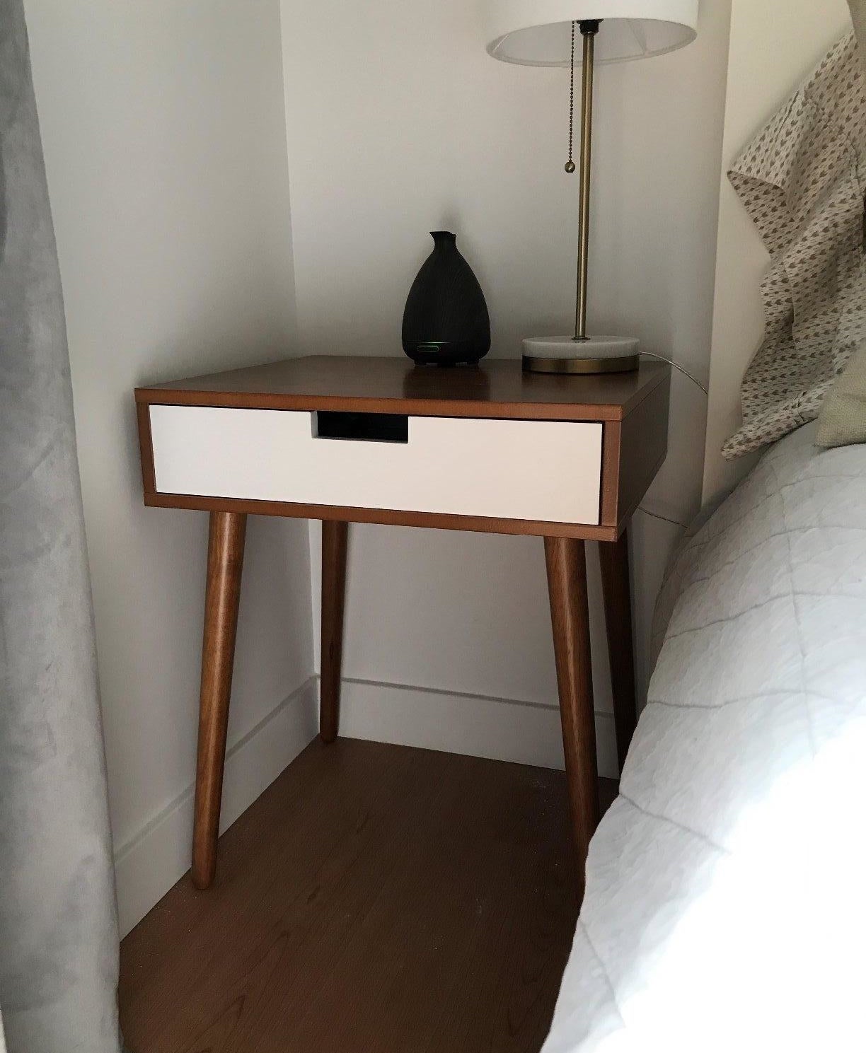 The brown and white nightstand