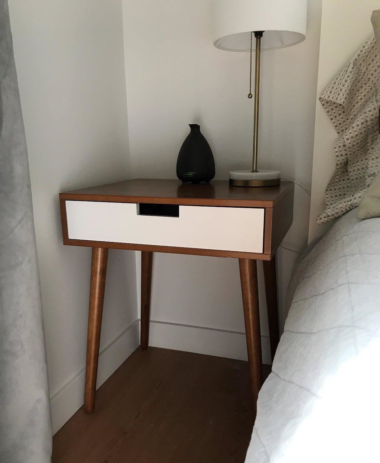 The brown and white nightstand