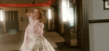 A gif of Melissa McCarthy singing, &quot;I feel pretty, oh, so pretty!&quot;