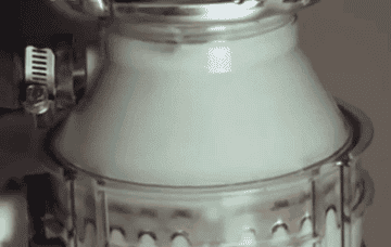 gif of the cleanser being used and foaming in a clear garbage disposal