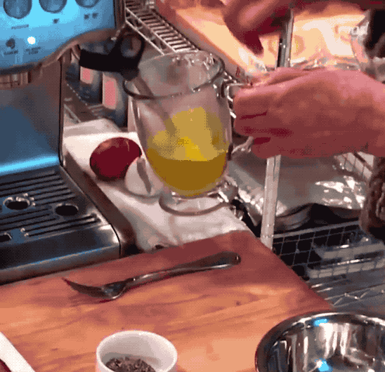 You know that little nozzle that steams milk? That's what she uses to cook her eggs.