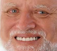 Close-up of man smiling and red-eyed