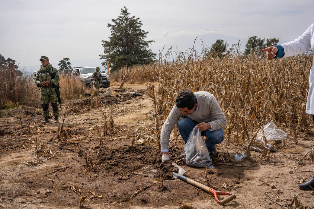 Armando Tapia takes samples of contaminated soil.